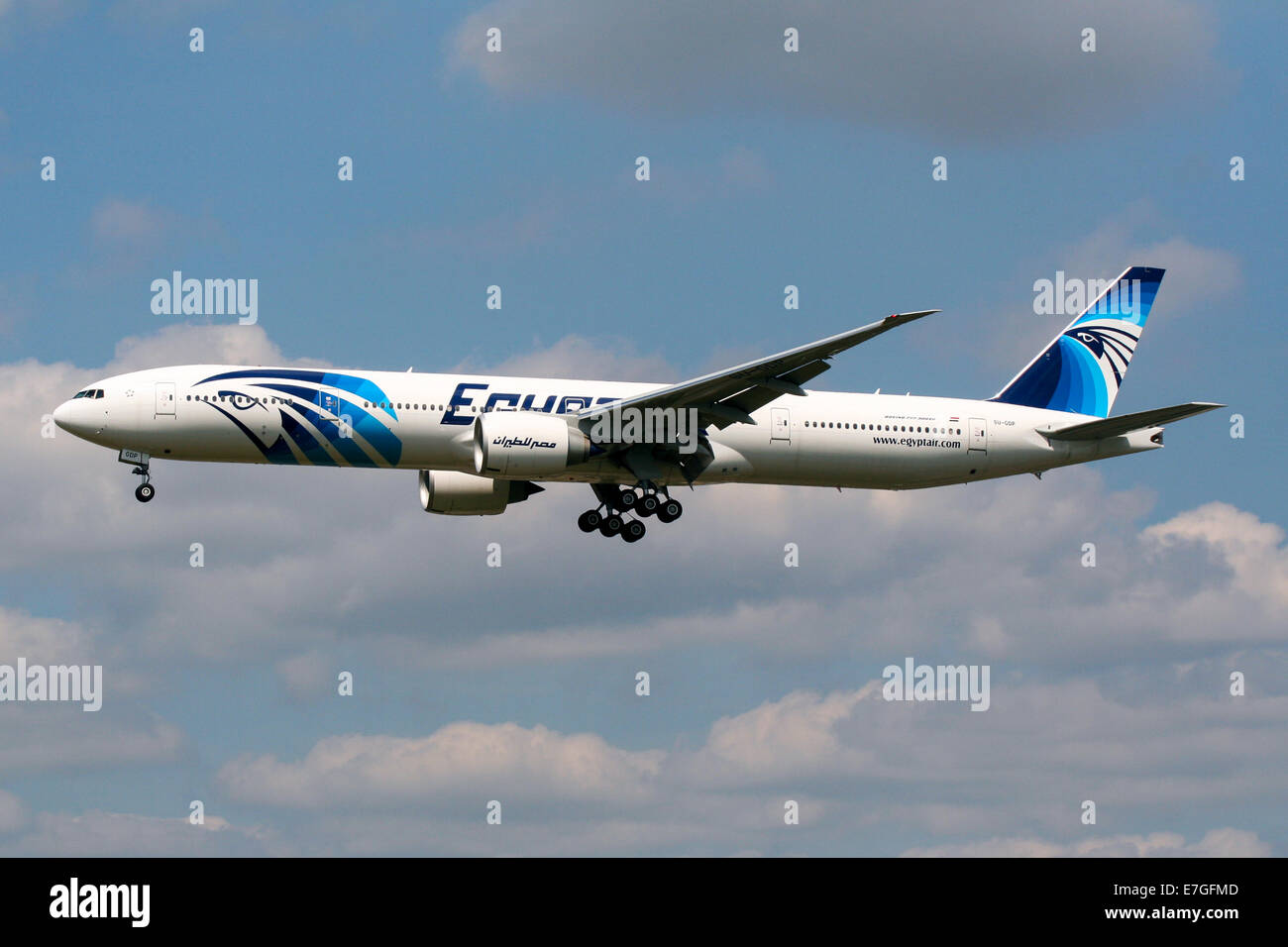 Egyptair Boeing 777-300 approaches runway 27L at London Heathrow airport. Stock Photo