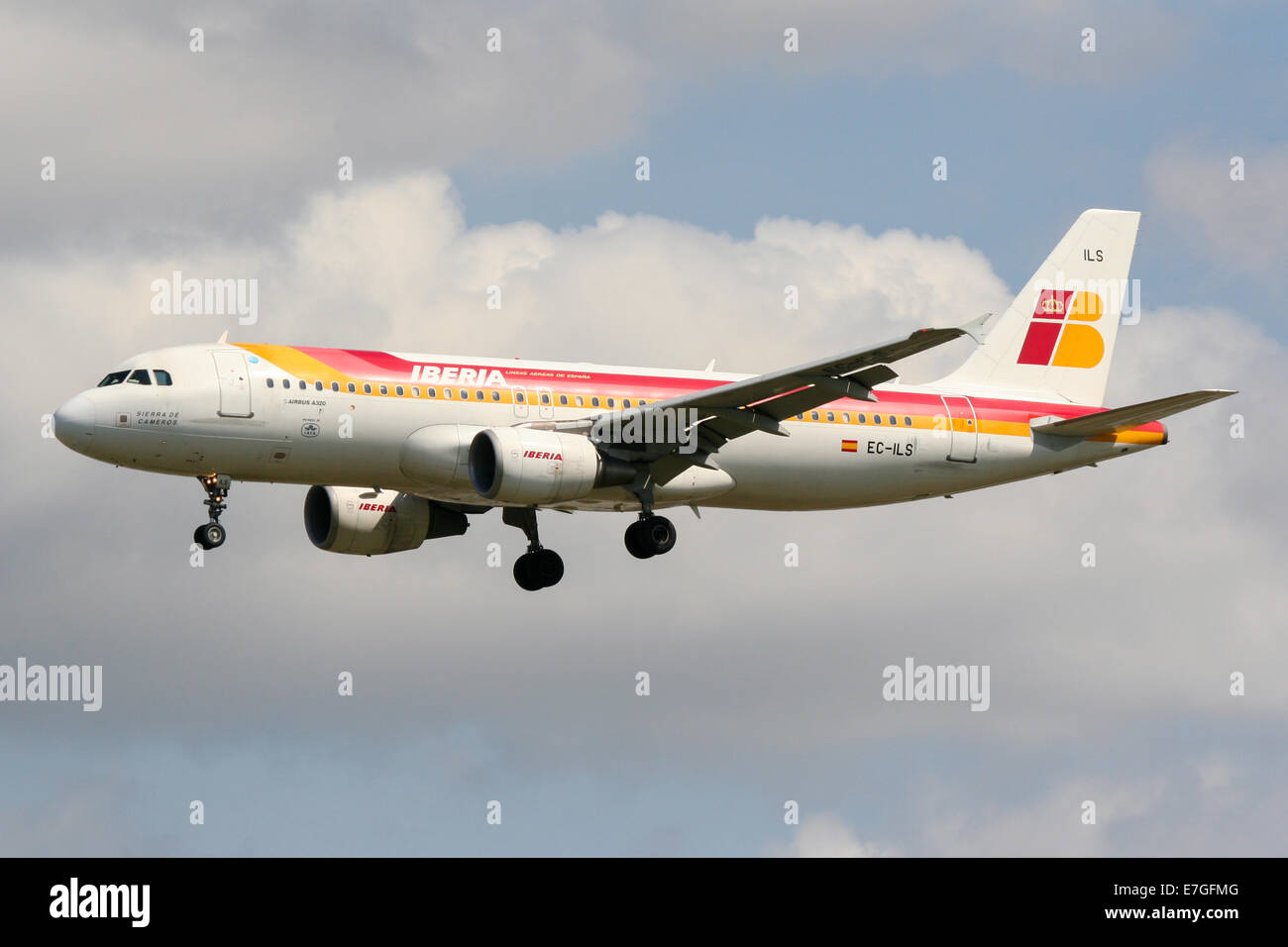 Iberia Airbus A320 approaches runway 27L at London Heathrow airport. Stock Photo