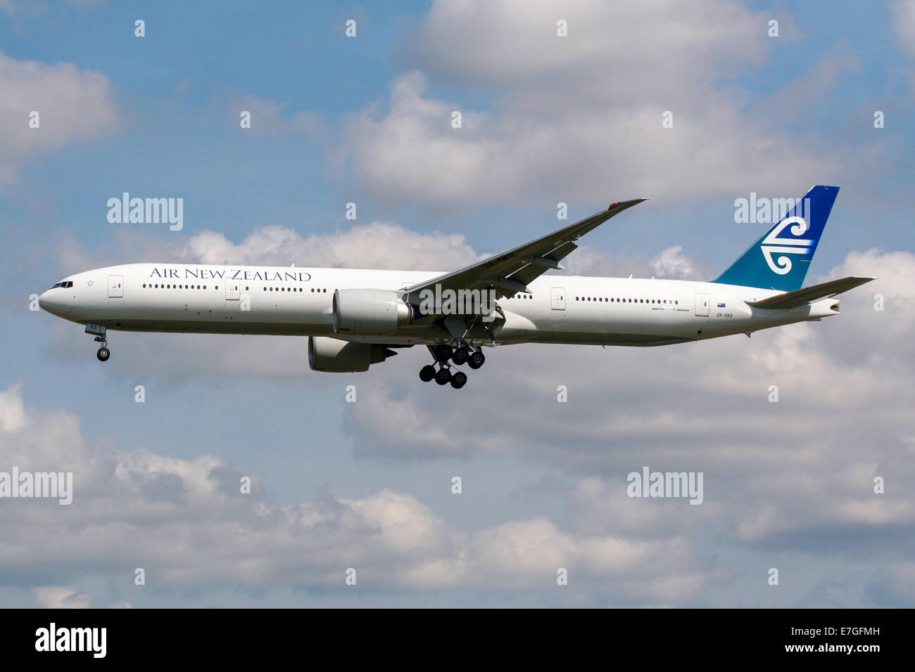 Air New Zealand Boeing 777-300 approaches runway 27L at London Heathrow airport. Stock Photo