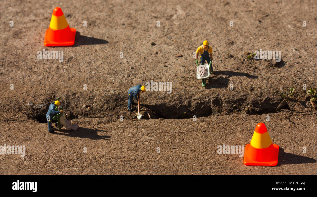 miniature figurines mimicking  real life situations Stock Photo