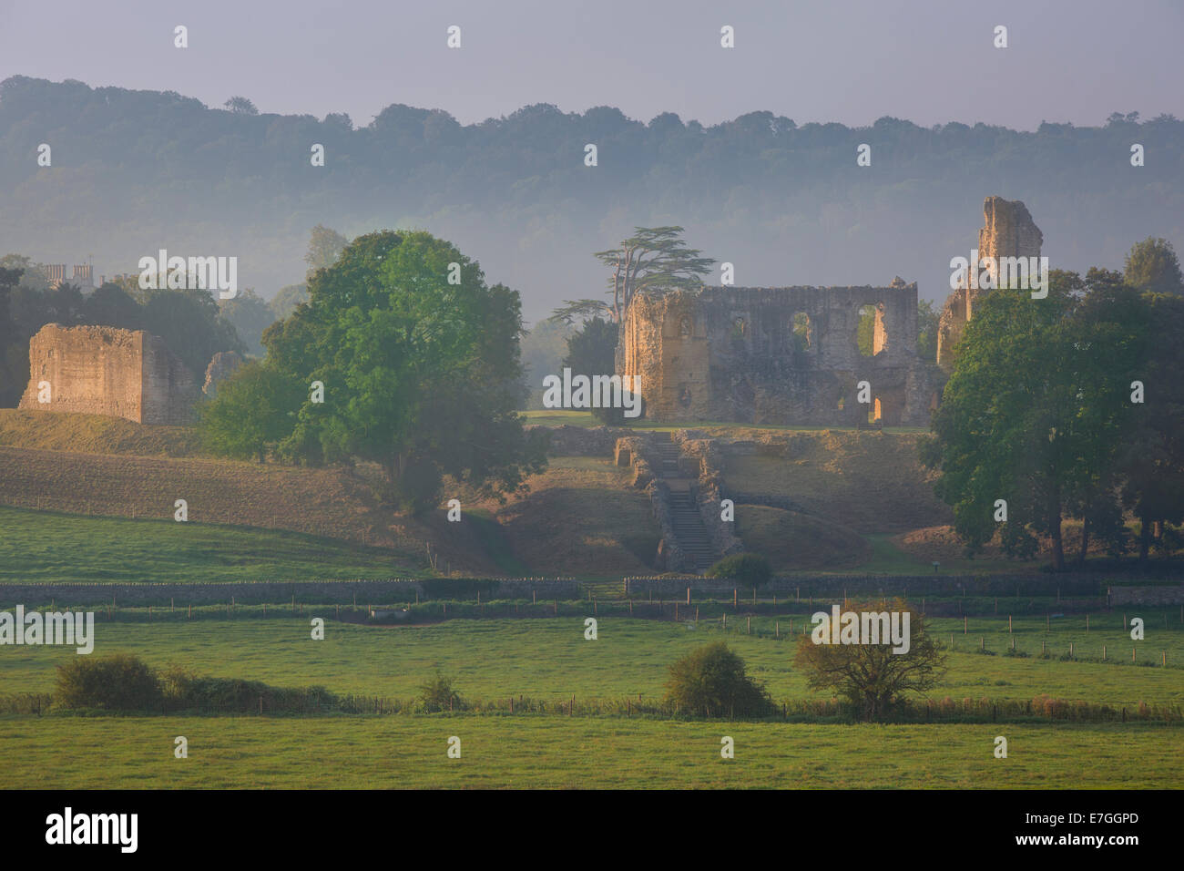 Misty dawn over Sherborne Castle - Sir Walter Raleigh's home, Sherborne, Dorset, England Stock Photo