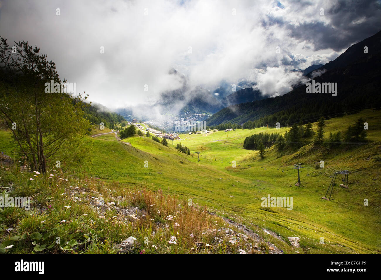 View down to Courmayeur, italian Alps, Tour de Mont Blanc Stock Photo