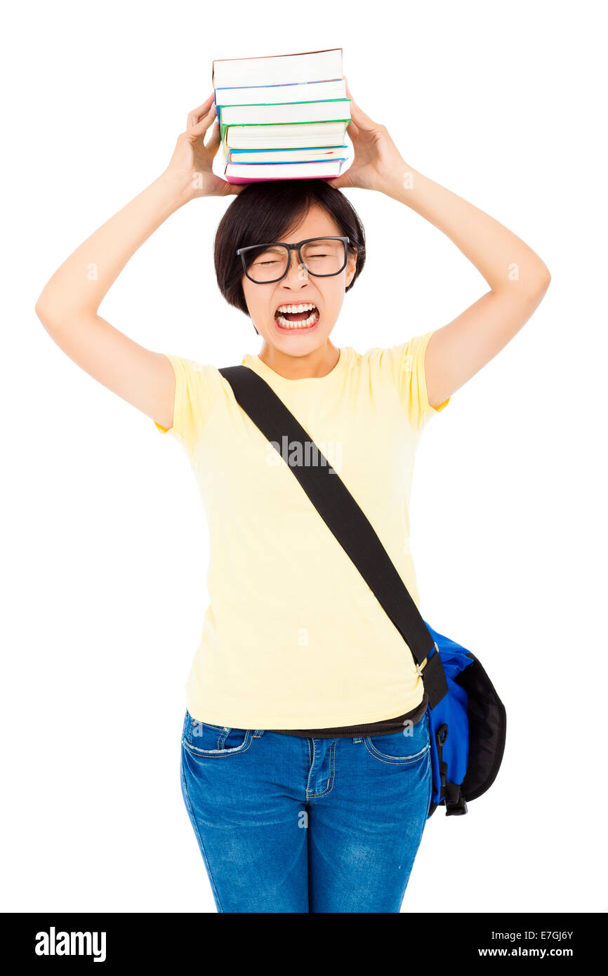 unhappy university student girl holding book on the head Stock Photo ...