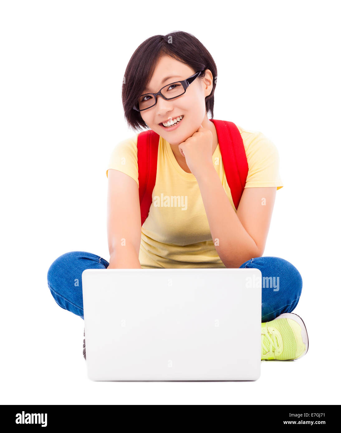 happy young student girl sitting on floor with a laptop Stock Photo - Alamy