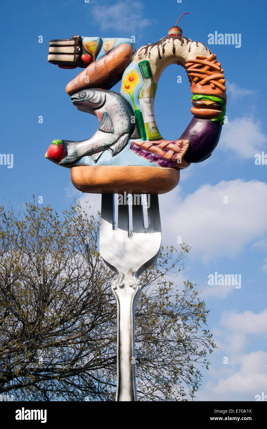 Food on a Giant Fork outside a restaurant in Austin Texas Stock Photo