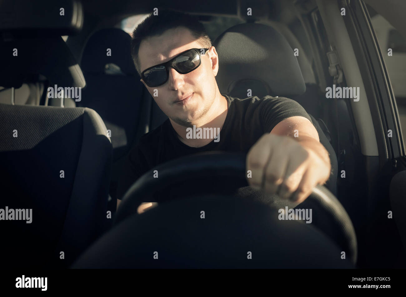 Car driver drive his car in black sunglasses Stock Photo - Alamy