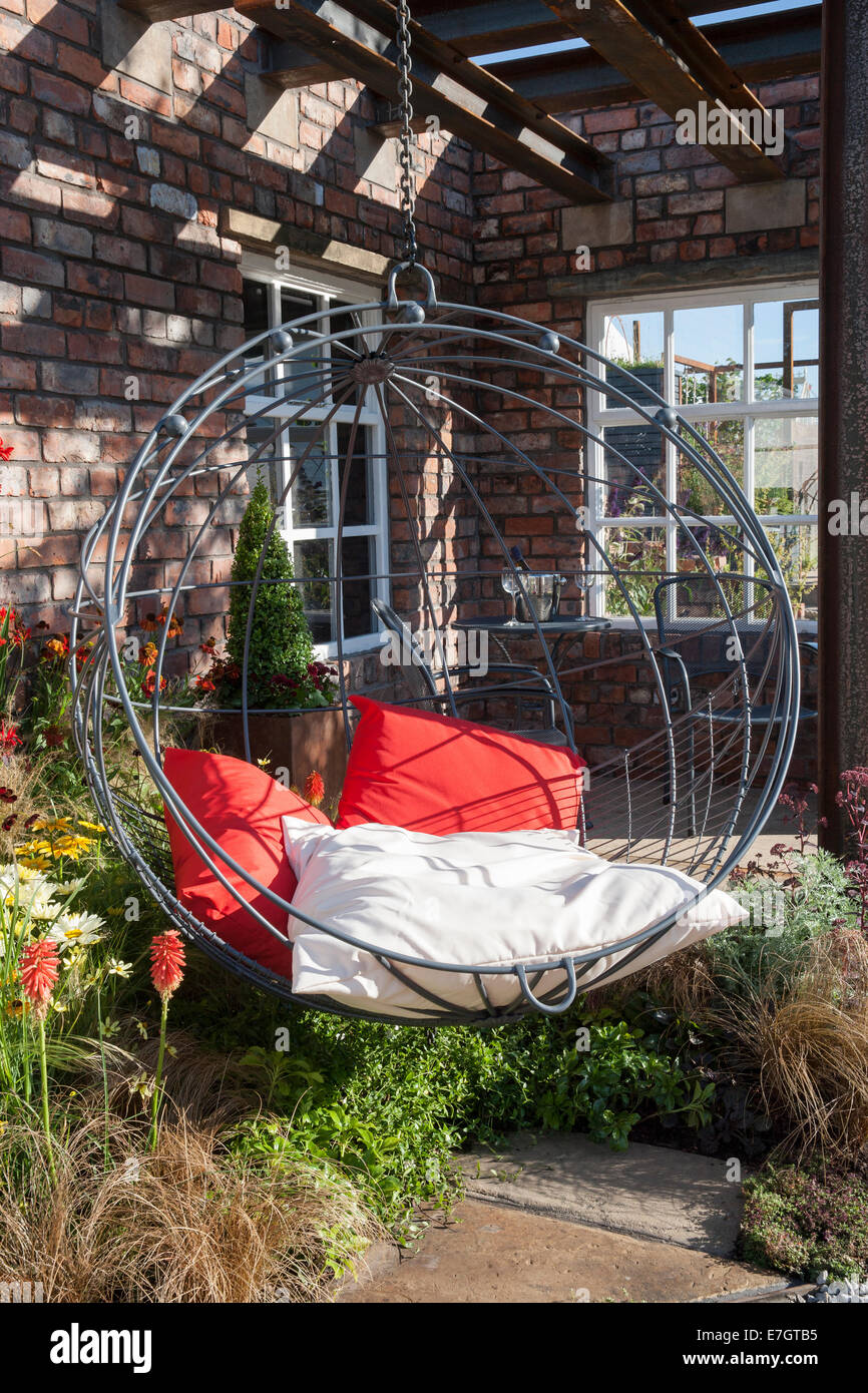 Garden - Industrial Transitions - swing seat in outdoor living area - Designer - Caroline Lord - Sponsor - Trav Stock Photo