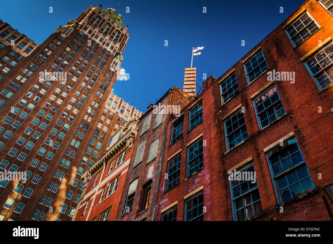 Abandoned brick building and highrise in Baltimore, Maryland. Stock Photo