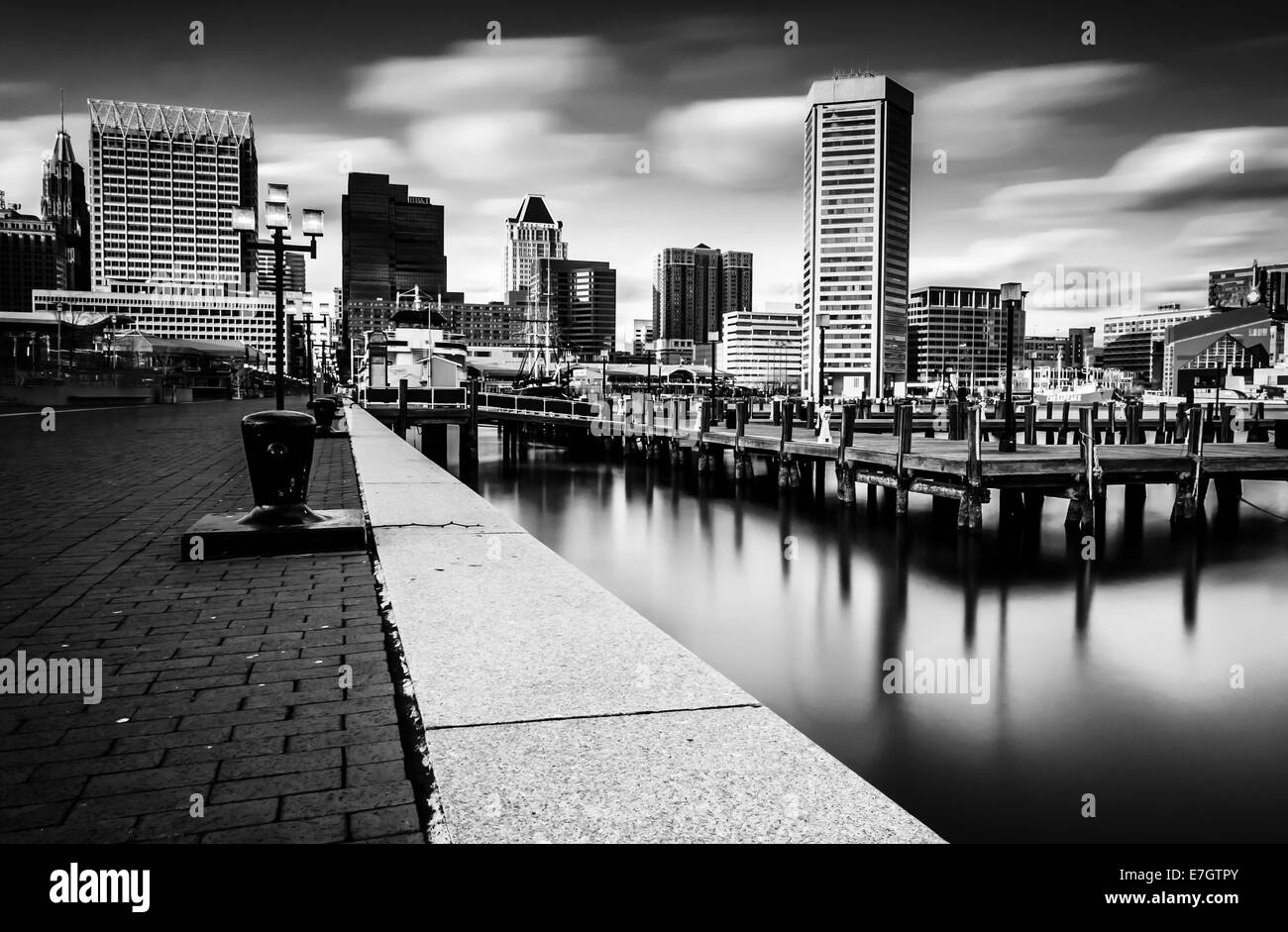 Long exposure of the Baltimore Skyline and Inner Harbor Promenade, Baltimore, Maryland Stock Photo