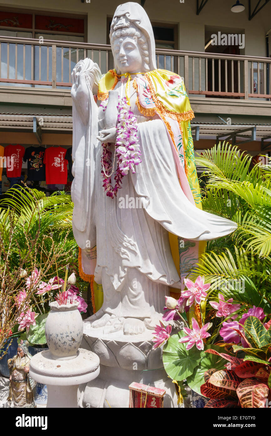 Hawaii,Hawaiian,Oahu,Honolulu,Chinatown,shrine,statue,Buddha,leis,flowers,USA,US,United,States,America Polynesia,HI140327034 Stock Photo