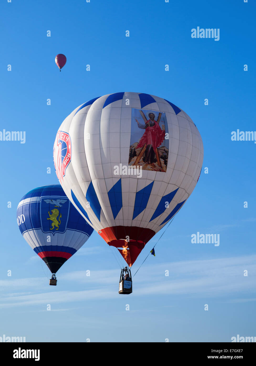 Minsk, Belarus - September 13, 2014: The FIRST OPEN CHAMPIONSHIP of Belarus on aeronautic sports.Three colored balloons in blue Stock Photo