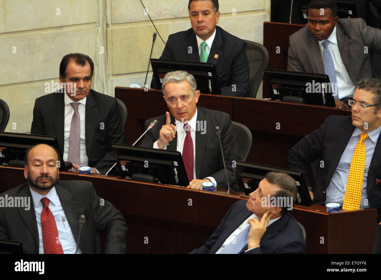 Bogota, Colombia. 17th Sep, 2014. The Senator and former Colombian President Alvaro Uribe (C) takes part in a debate in Bogota, Colombia, on Sept. 17, 2014. Uribe attended a debate which focused on the political control of paramilitary activity on Wednesday. Credit:  German Enciso/COLPRENSA/Xinhua/Alamy Live News Stock Photo