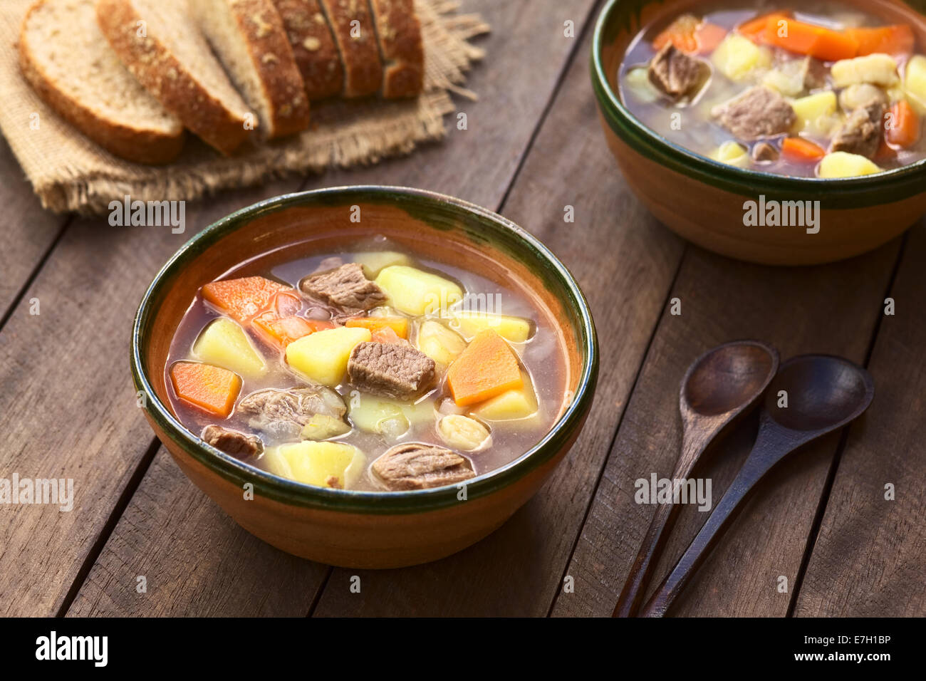 Traditional Hungarian soup called Gulyasleves made of beef, potato, carrot, onion, csipetke (homemade pasta) and paprika Stock Photo
