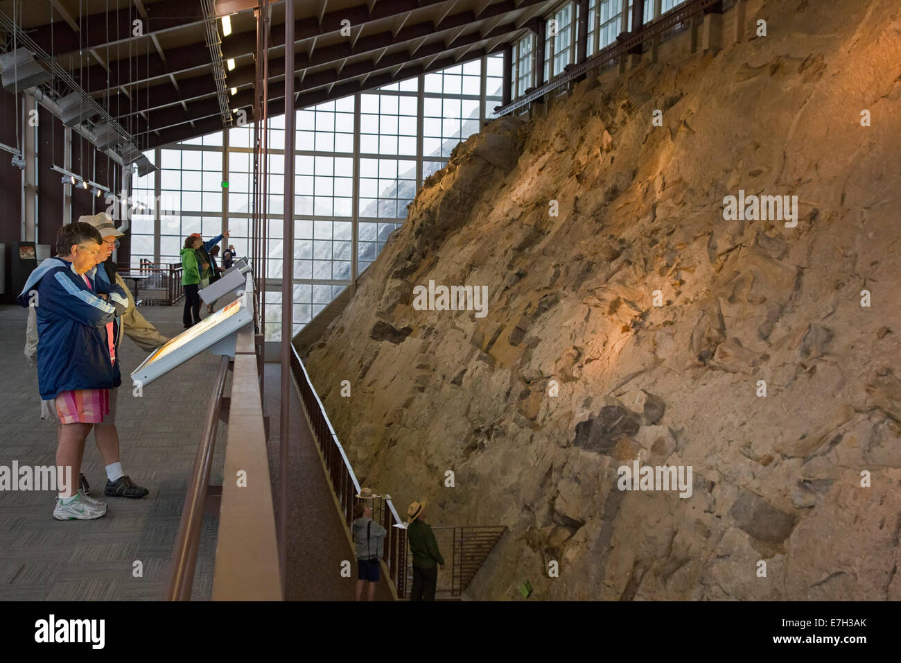 Jensen, Utah Visitors view dinosaur bones in the Quarry Exhibit Hall