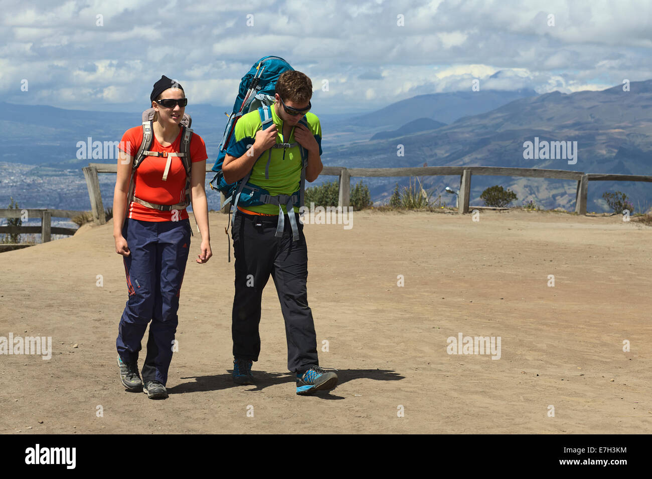 Unidentified young people hiking on the Pichincha mountain close to the TeleferiQo station at Cruz Loma in Quito, Ecuador Stock Photo