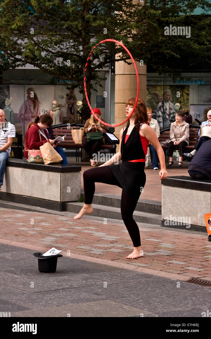 https://c8.alamy.com/comp/E7H6RJ/an-attractive-young-woman-dancing-with-her-hula-hoop-in-dundee-city-E7H6RJ.jpg