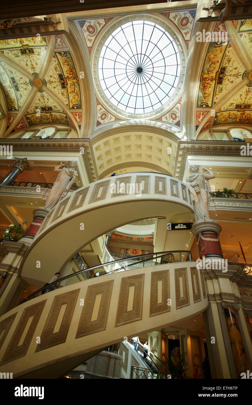Spiral escalators and pool in the lobby of the Forum Shops, Caesars Palace, Las Vegas, Nevada, USA Stock Photo
