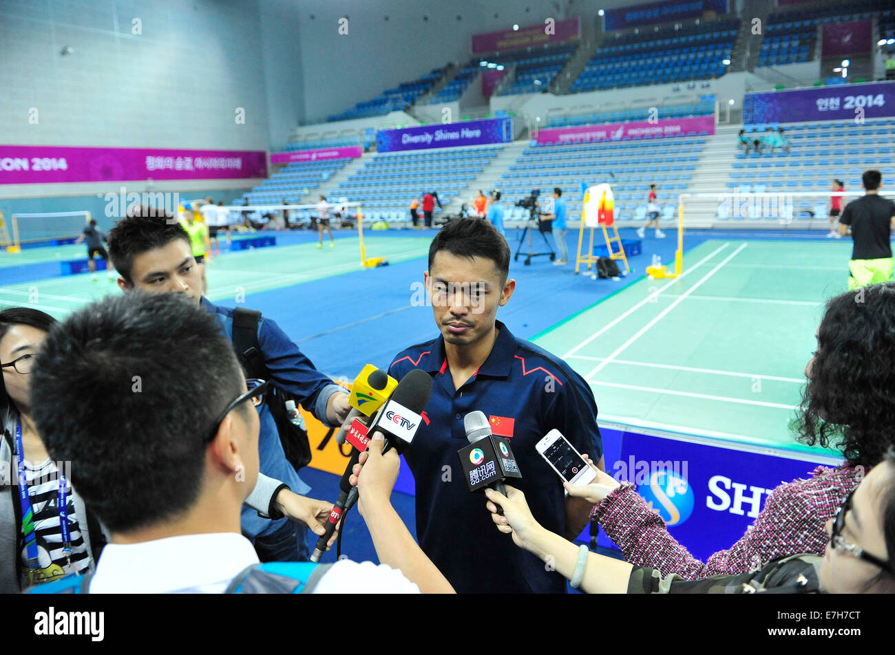 Incheon, South Korea. 18th Sep, 2014. Chinese badminton athlete Lin Dan receives an interview after a training session for the 17th Asian Games in Incheon, South Korea, Sept. 18, 2014. Credit:  Ye Pingfan/Xinhua/Alamy Live News Stock Photo