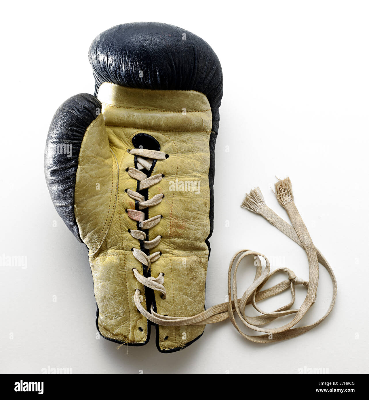 Boxing Glove Lying on White Background Stock Photo