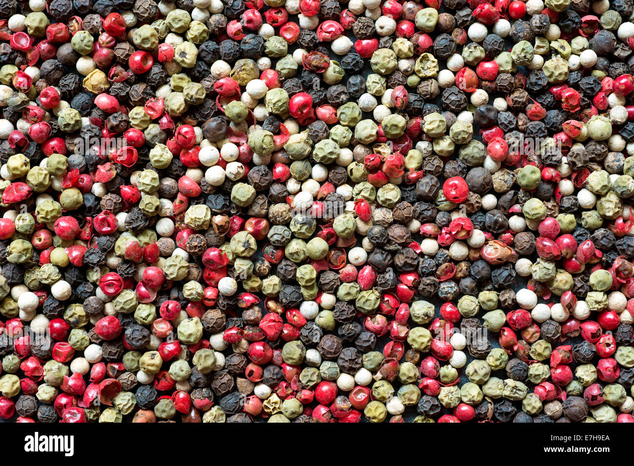 different types of peppercorns as a background Stock Photo Alamy