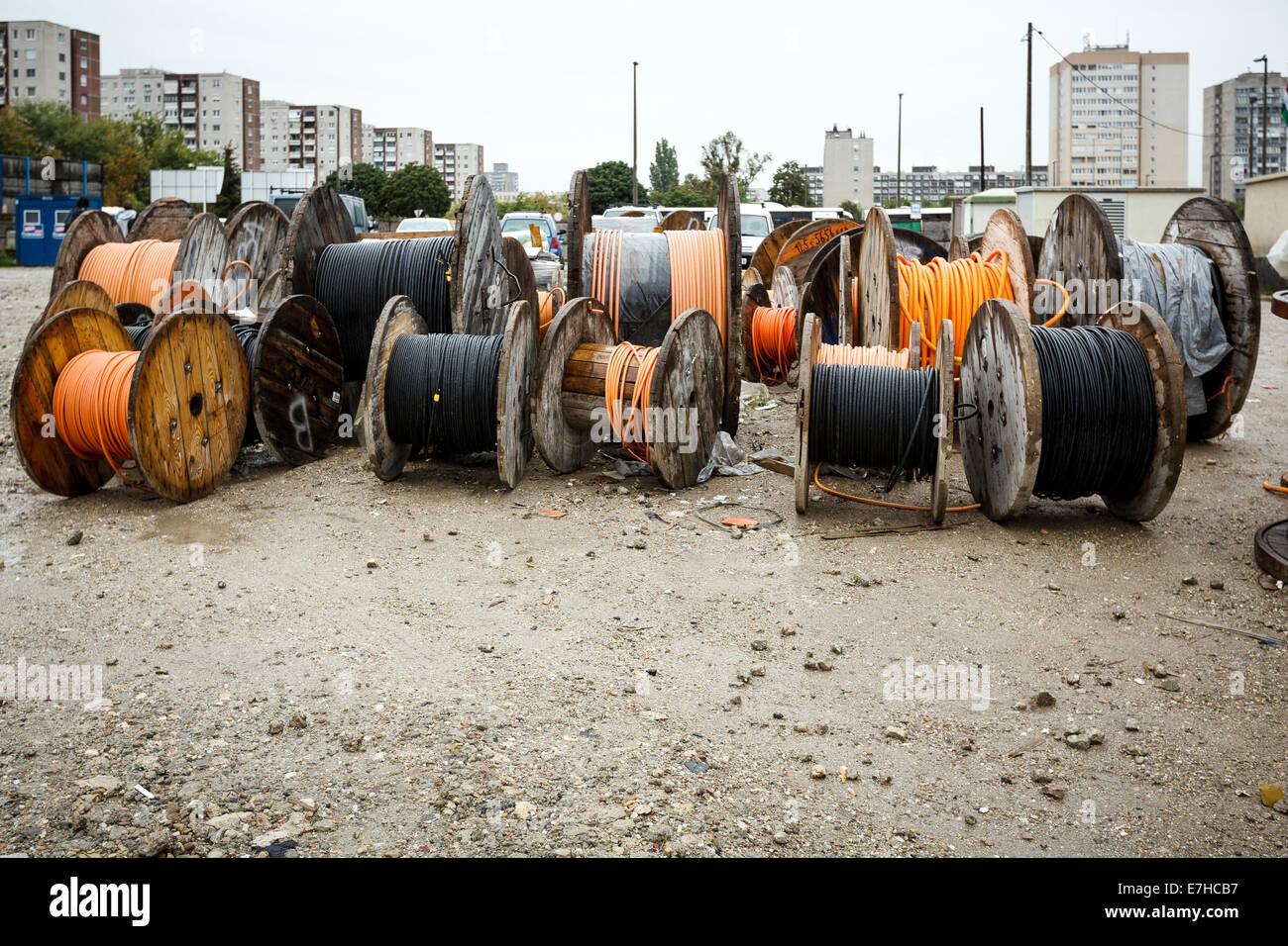 large wooden spools for the transport of electric cables in a landfill of  recyclable materials Stock Photo - Alamy