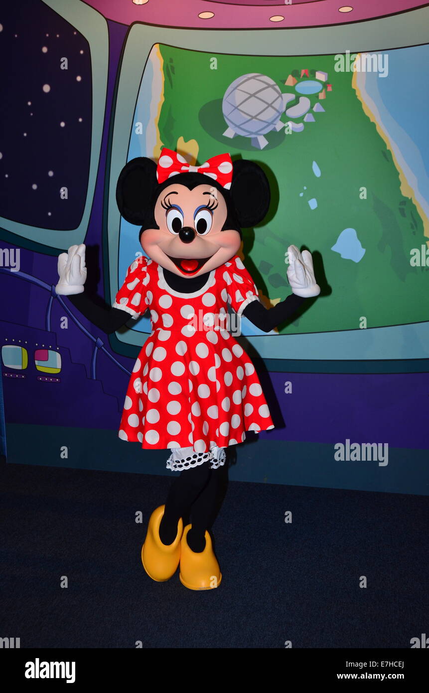 Minnie Mouse poses for photographs at Magic Kingdom, Walt Disney World, Orlando, Florida. Stock Photo