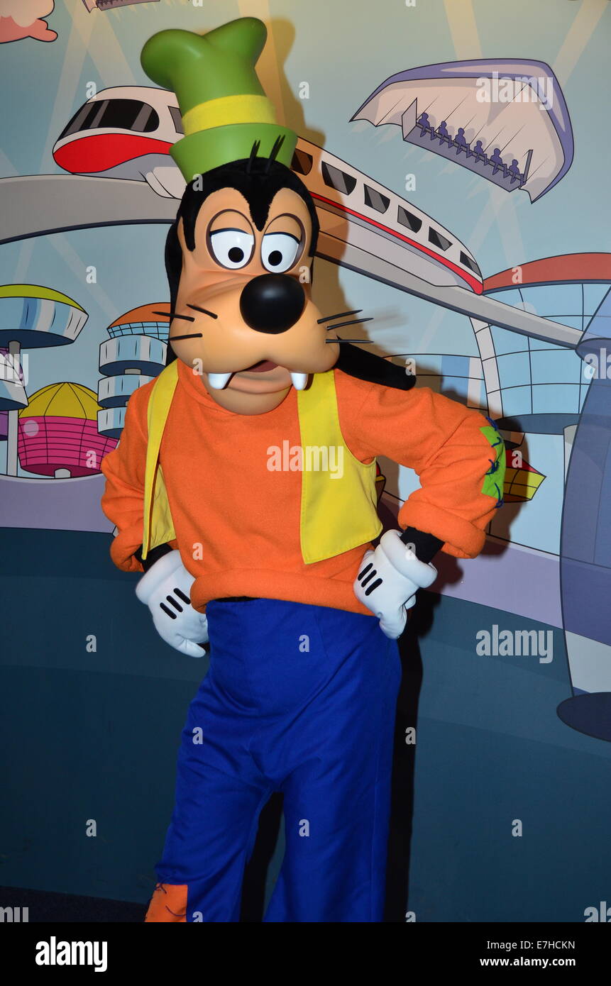 Goofy poses for photographs at Magic Kingdom, Walt Disney World, Orlando, Florida. Stock Photo