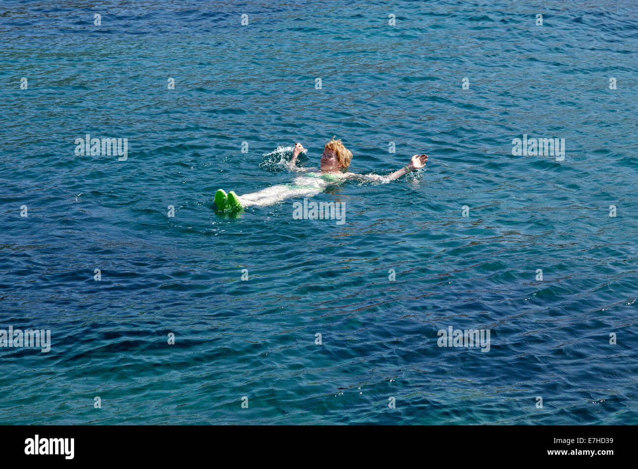 woman swimming in the sea at Lun, Pag Island, North Dalmatia, Croatia Stock Photo