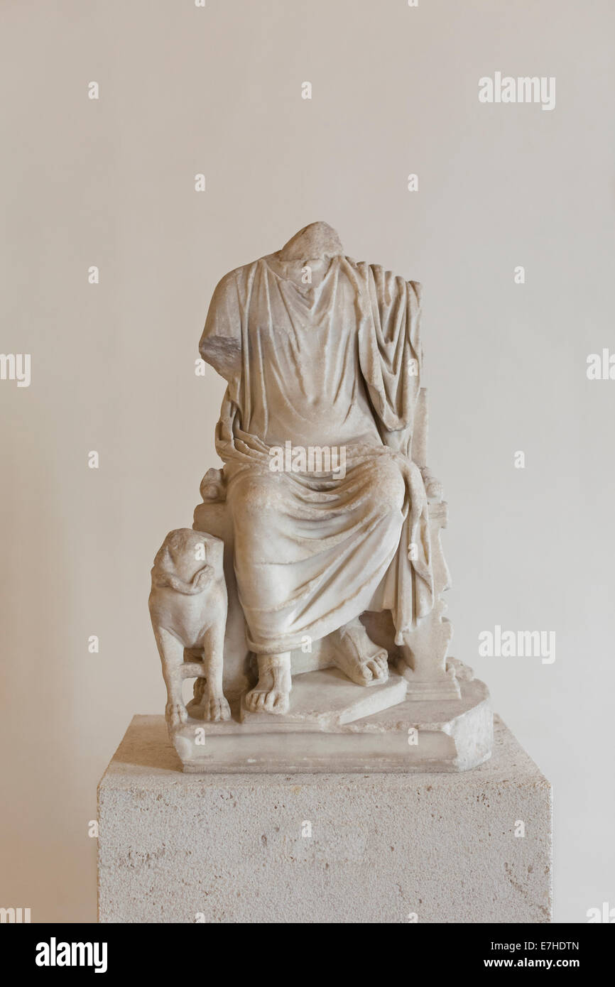 Headless statue of enthroned Serapis Stock Photo