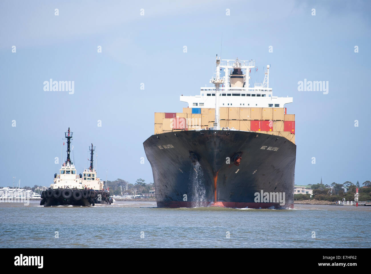 Container ships carry all of their cargo in intermodal containers. Stock Photo