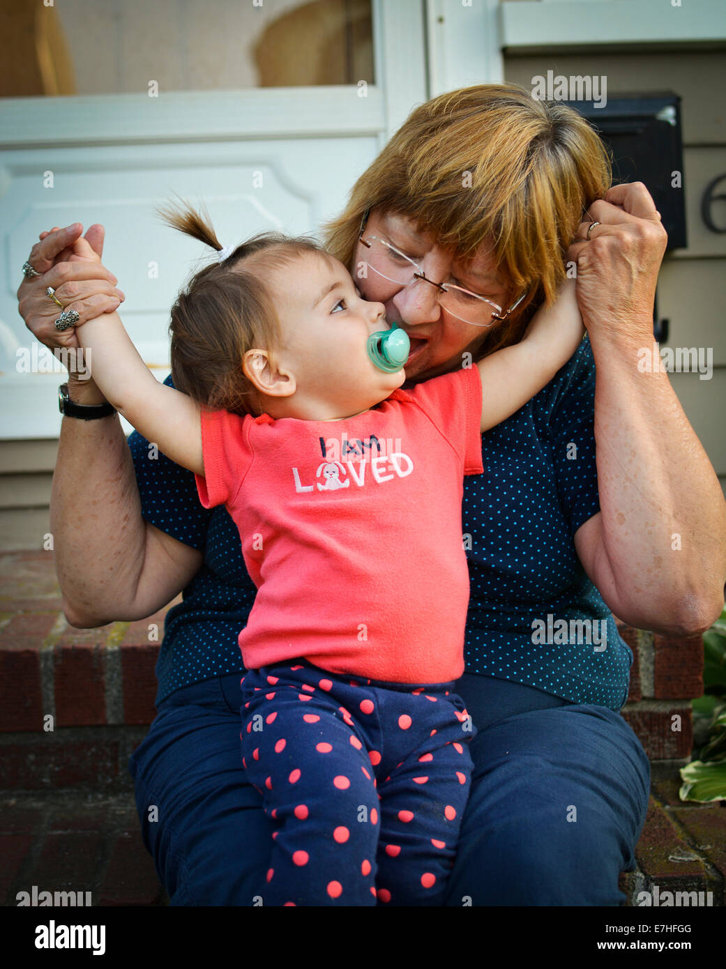 Baby and Grandmother having fun Stock Photo