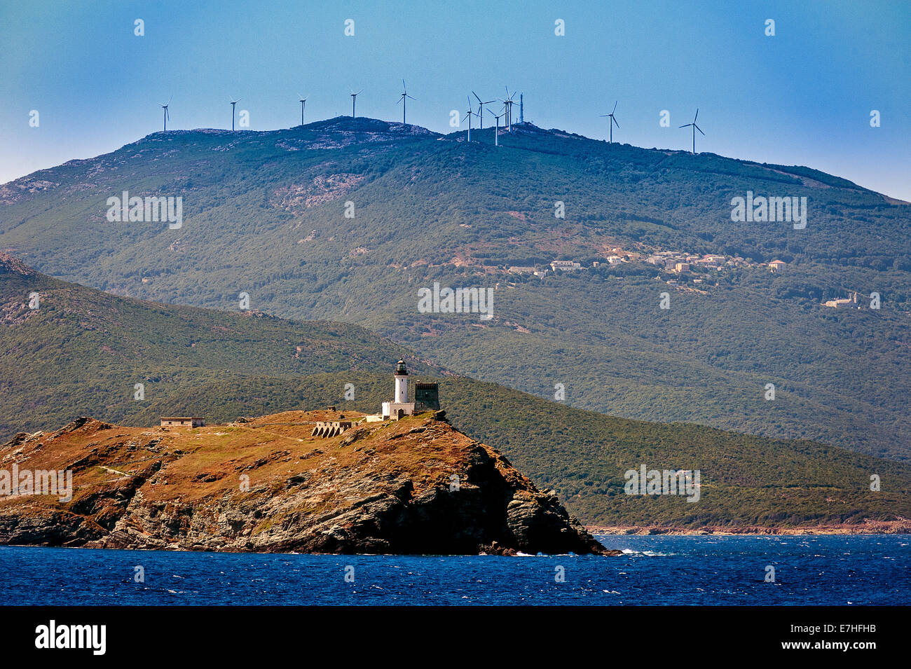 Europe, France, Haute-Corse, Cap Corse, Barcaggio. Giraglia island and its lighthouse. Stock Photo