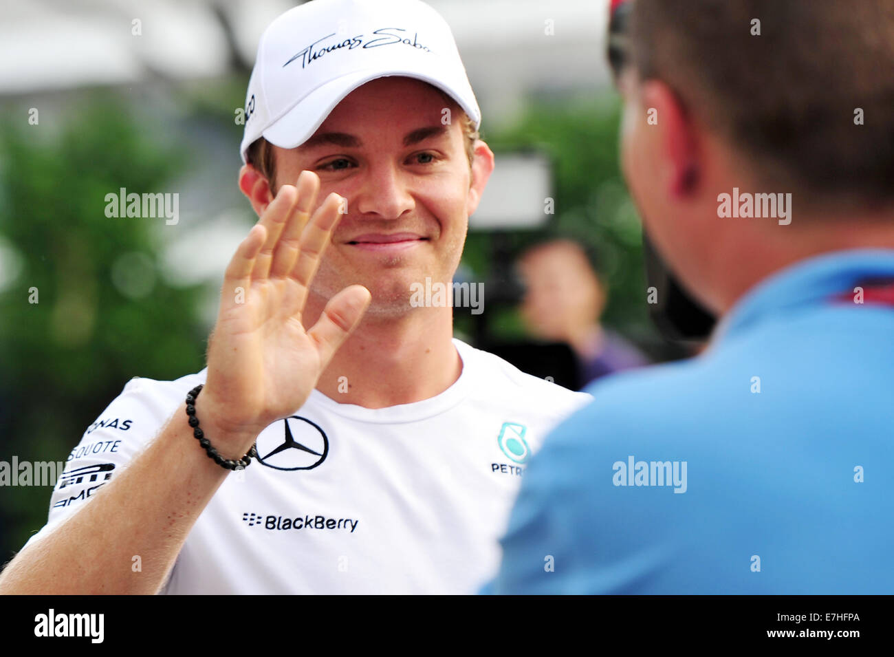 Singapore. 18th Sep, 2014. Mercedes German driver Nico Rosberg arrives at the F1 Pit Building in Singapore on Sept. 18, 2014. Singapore F1 Night Race will be held from Sept. 19 to 21 at the Marina Bay road circuit. Credit:  Then Chih Wey/Xinhua/Alamy Live News Stock Photo