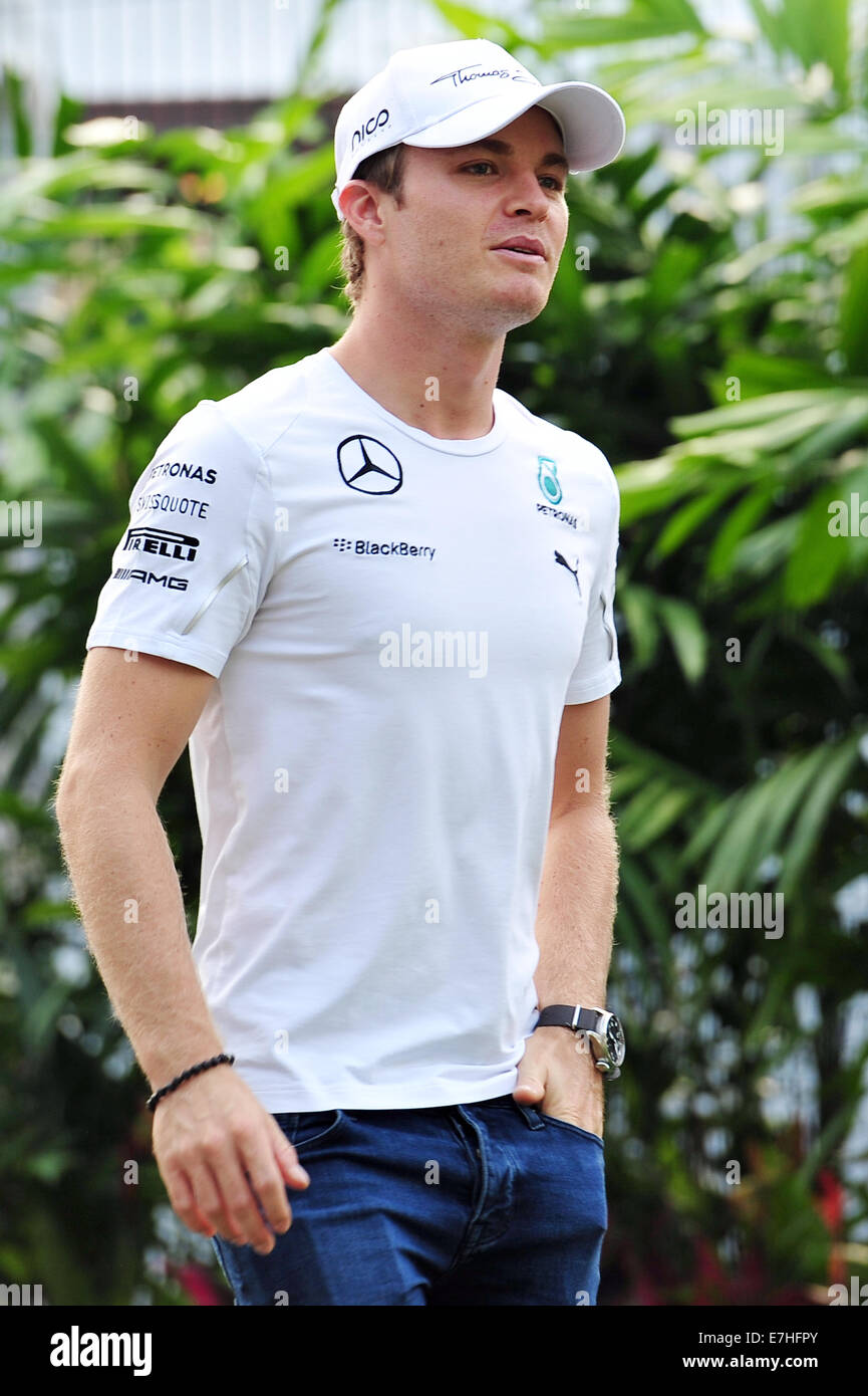 Singapore. 18th Sep, 2014. Mercedes German driver Nico Rosberg arrives at the F1 Pit Building in Singapore on Sept. 18, 2014. Singapore F1 Night Race will be held from Sept. 19 to 21 at the Marina Bay road circuit. Credit:  Then Chih Wey/Xinhua/Alamy Live News Stock Photo