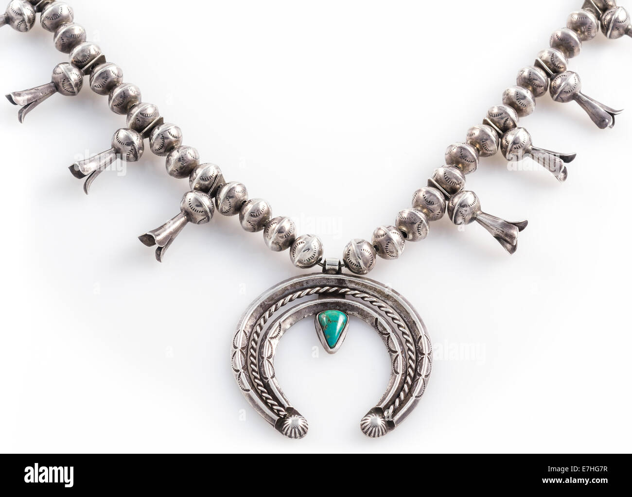 Silver and Turquoise Squash Blossom Necklace. Stock Photo