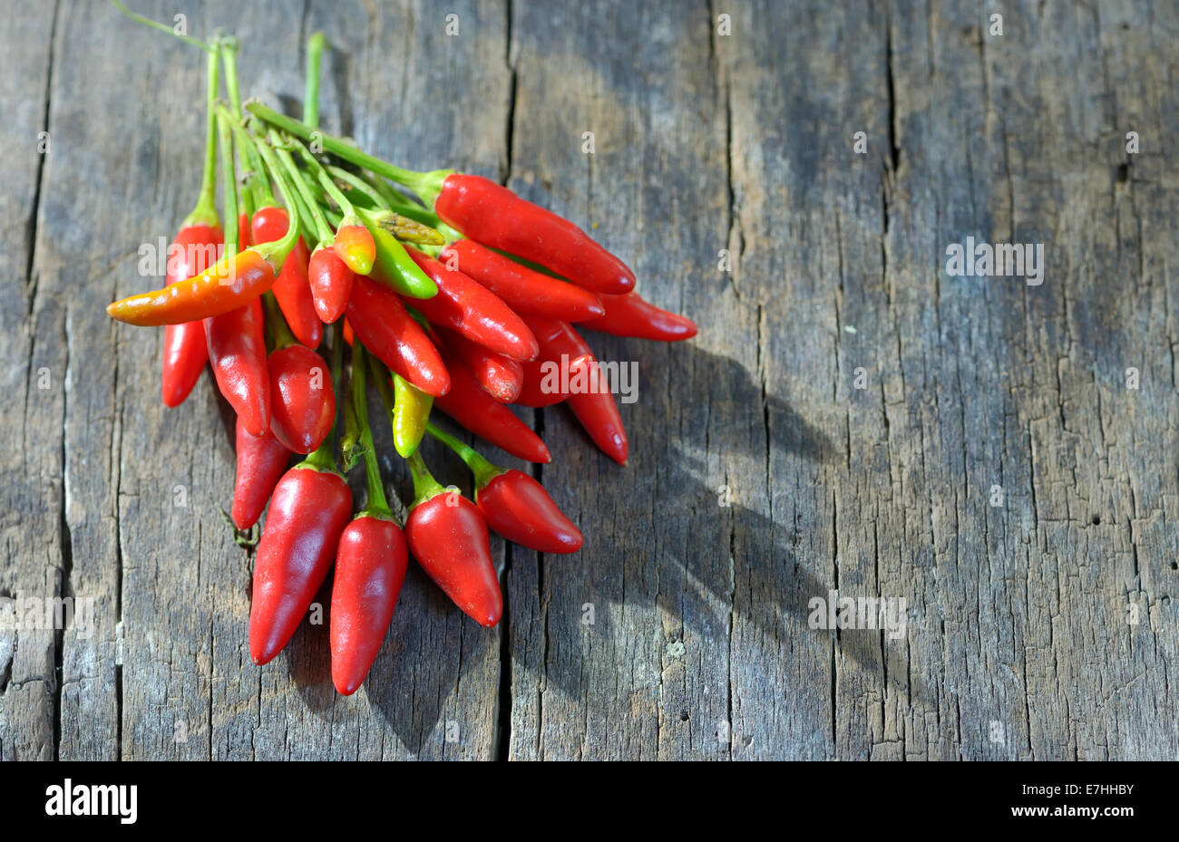 Chili pepper on old wood table Stock Photo