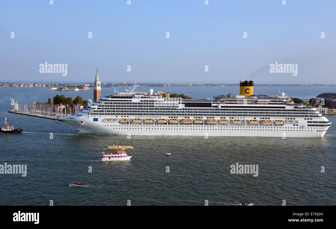 A Costa cruise ship Thomson Majesty leaves the harbour and passes close to the island San Giorno Maggiore in Venice, Germany, 08 September 2014. A debate is currently going on about the passage of cruise ships this close to the city and the dangers for the environment this poses. The huge cruise ships are supposed to using the route close to Giudica in the future but rater the one closer to the train station, which is further from the city. Channels would have to be deepened and widened for this solution, however. Photo: Waltraud Grubitzsch -NO WIRE SERVICE- Stock Photo