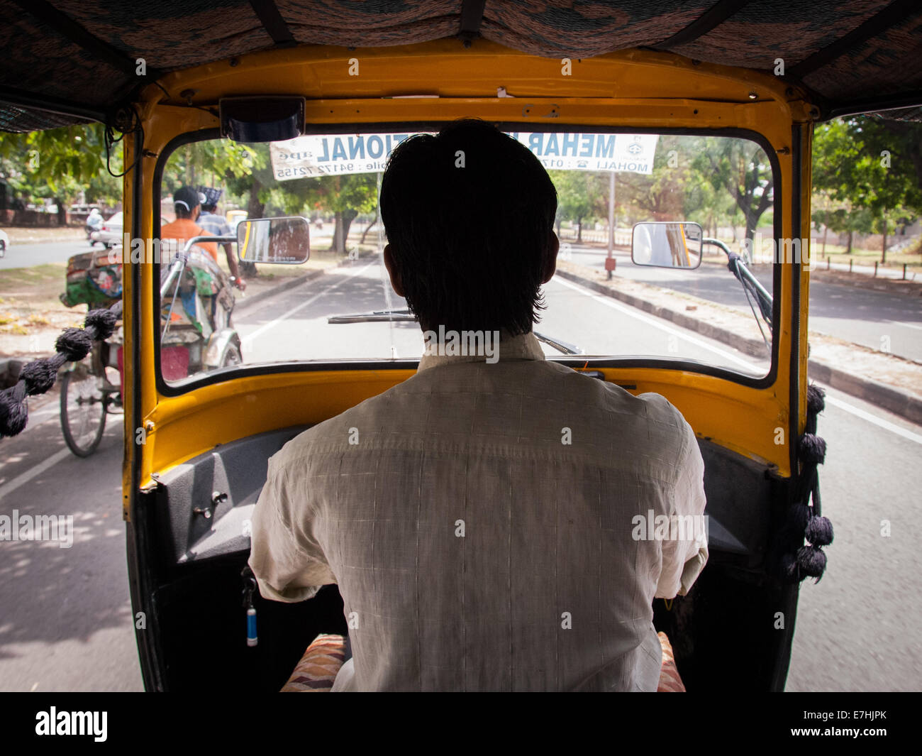 tuk tuk auto rickshaw taxi driver in Delhi India Stock Photo