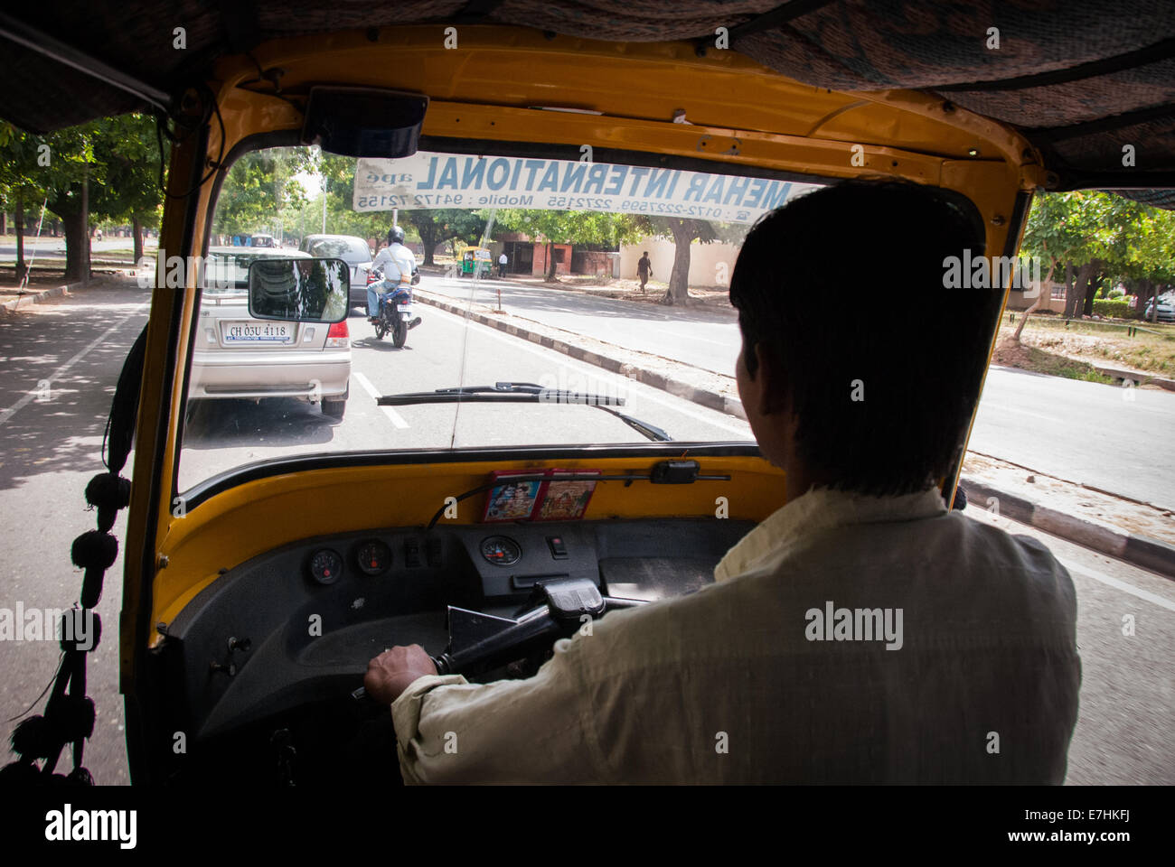 tuk tuk auto rickshaw taxi driver in Delhi India Stock Photo