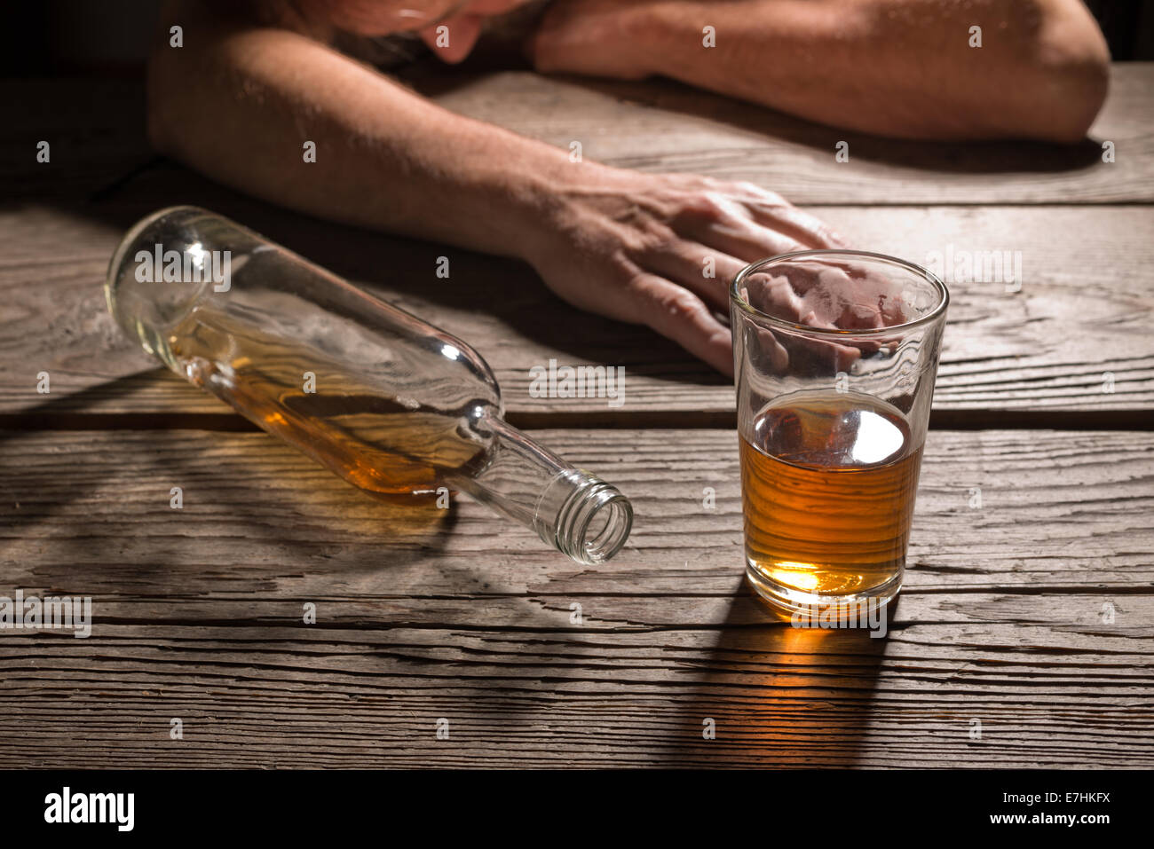 drunk man with a glass of brandy in the pub Stock Photo Alamy