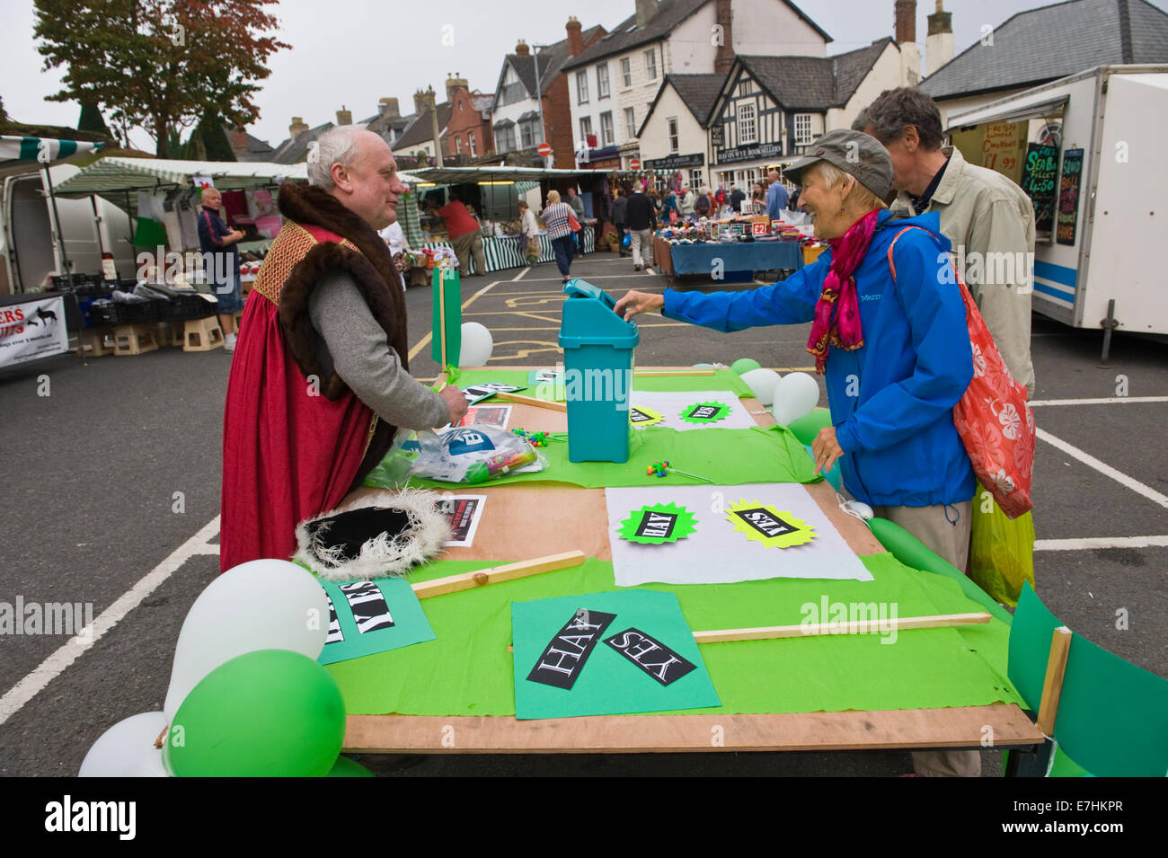 Bookseller Derek Addyman aka 'Prince Derek Fitz Pitt Booth' successor to King Richard I of Hay asking voters in Hay-on-Wye to reaffirm the town's status as an independent kingdom and demanding it's own postcode HOW1, plus declaring the town a World Heritage Site. The booktown of Hay-on-Wye is already an SSSI - a Site of Special Shopping Interest. Stock Photo