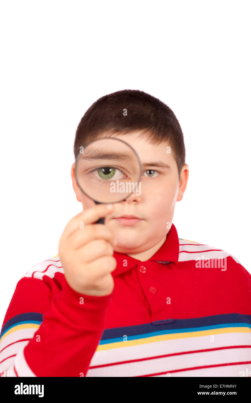 Closeup looking into magnifying glass hires stock photography and