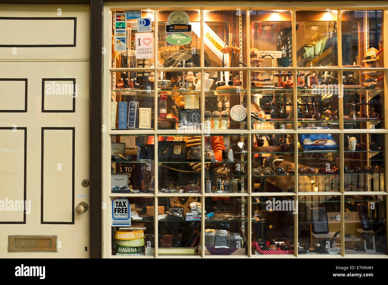 Pipe and tobacco shop window with closed door Stock Photo
