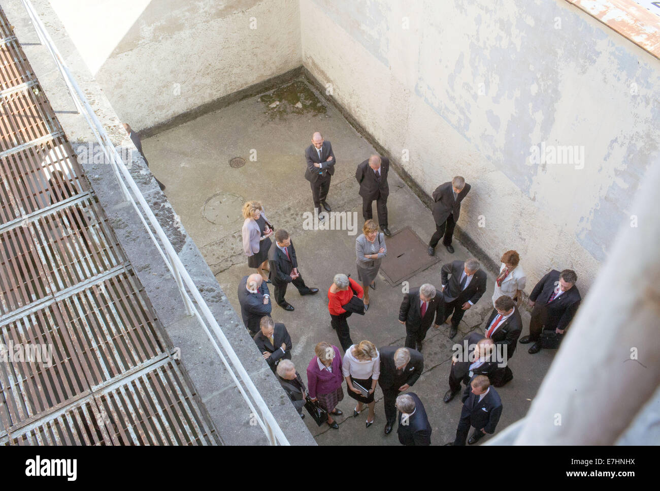 German President Joachim Gauck, King Philippe of Belgium, Grand Duke Henri of Luxembourg, Crown Prince Alois von und zu Liechtenstein, Austrian President Heinz Fischer and Swiss President Didier Burkhalter stand in the prison yard of the memorial of the former Stasi Remand Prison during the 11th meeting of the German-speaking heads of state in Rostock, Germany, 18 September 2014. They are discussing questions about demographic change and remembering the peaceful revolution in East Germany 25 years ago at the informal meeting. Photo: JENS BUETTNER/dpa Stock Photo