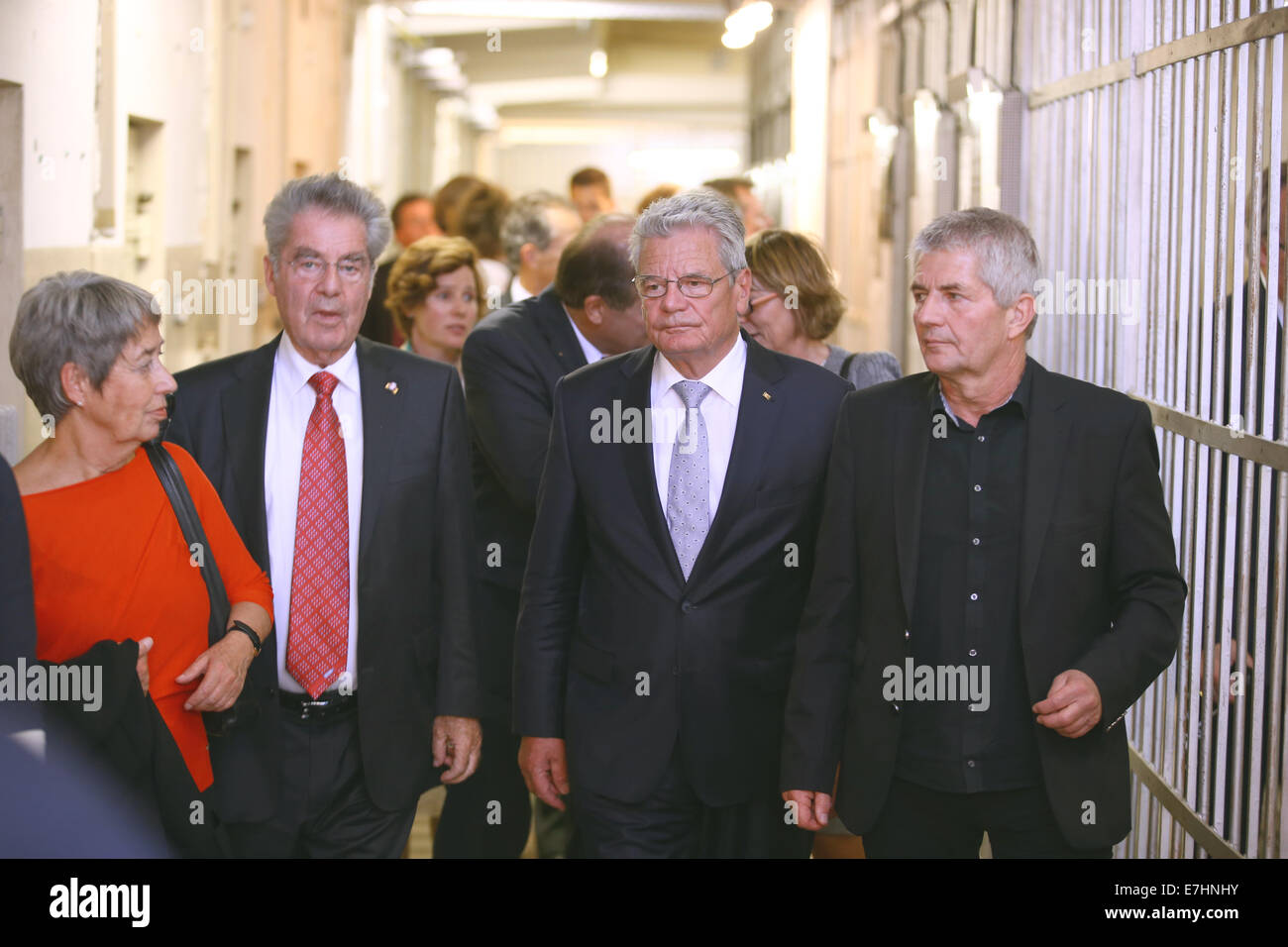 German President Joachim Gauck (2-R), German journalist and former East German dissident who took office as Federal Commissioner for the Stasi Records, Roland Jahn (R), Austrian President Heinz Fischer (2-L) and his wife Margit (L) walk through the memorial at the former Stasi Remand Prison during the 11th meeting of the German-speaking heads of state in Rostock, Germany, 18 September 2014. They are discussing questions about demographic change and remembering the peaceful revolution in East Germany 25 years ago at the informal meeting. Photo: JENS BUETTNER/dpa Stock Photo