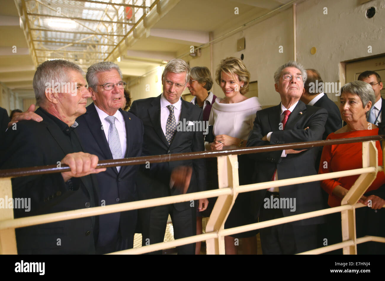 German President Joachim Gauck (2-L), German journalist and former East German dissident who took office as Federal Commissioner for the Stasi Records, Roland Jahn (L), King Philippe of Belgium, Queen Mathilde of Belgium, Austrian President Heinz Fischer and his wife Margit (L-R) stand in the memorial of the former Stasi Remand Prison during the 11th meeting of the German-speaking heads of state in Rostock, Germany, 18 September 2014. They are discussing questions about demographic change and remembering the peaceful revolution in East Germany 25 years ago at the informal meeting. Photo: JENS Stock Photo