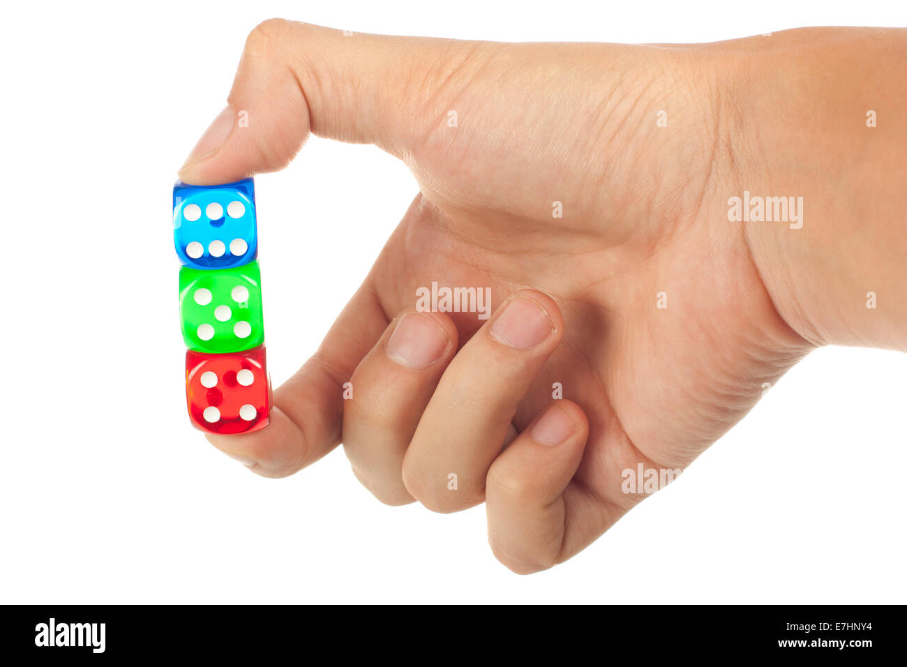 Three dice in hand isolated over white background Stock Photo