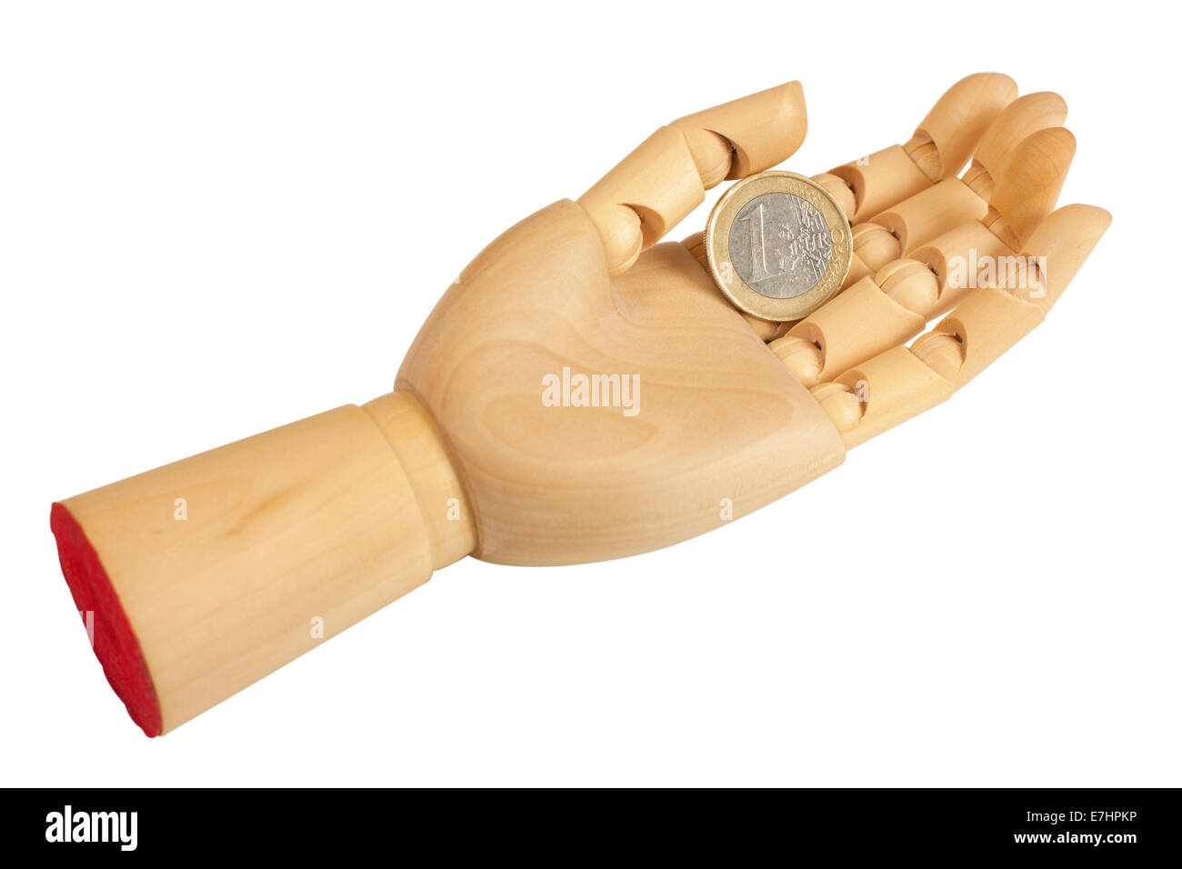 Outstretched wooden hand with one euro coin isolated over white background with clipping path Stock Photo