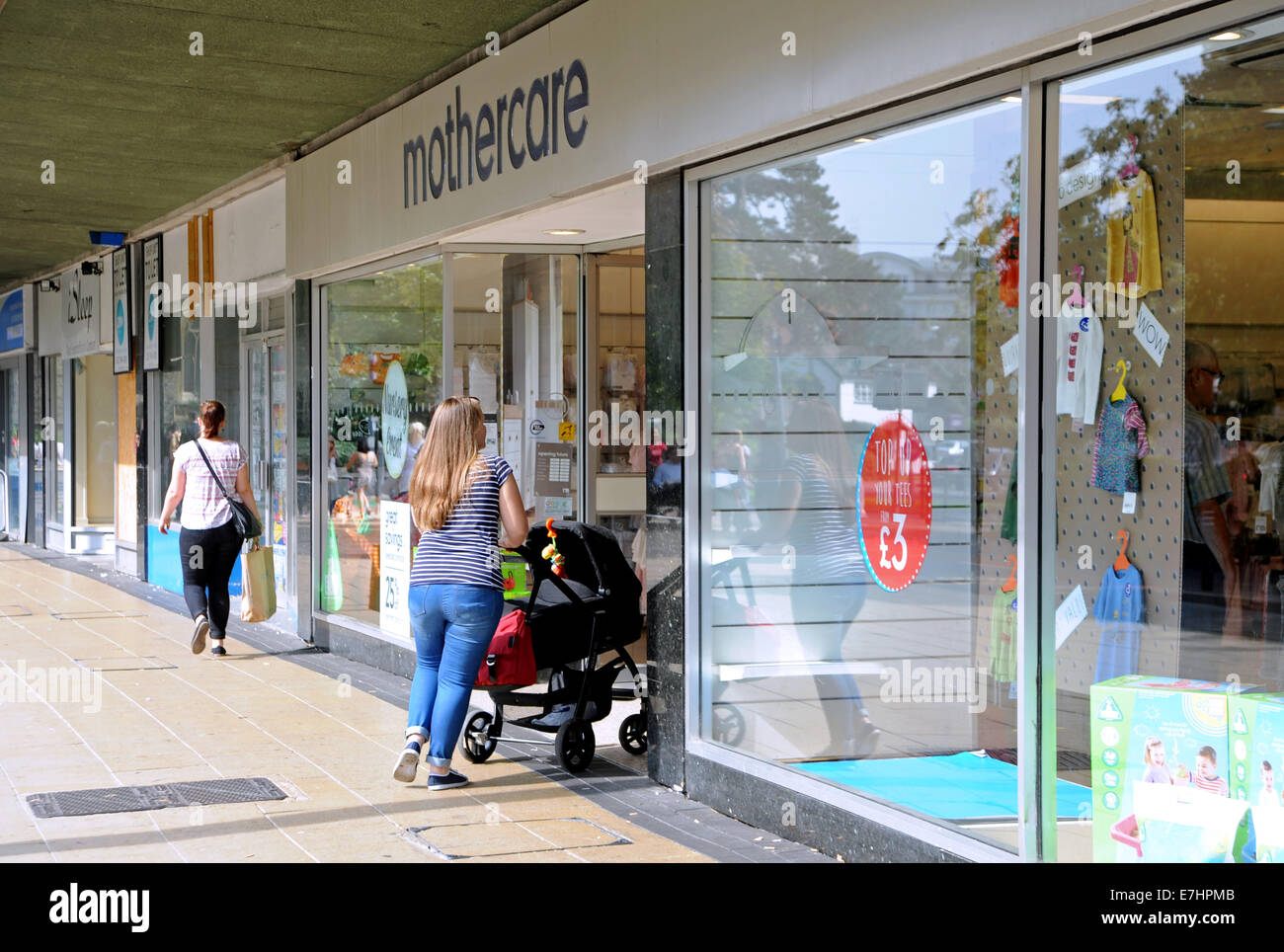Crawley West Sussex UK - Mothercare store and shop with people Stock Photo
