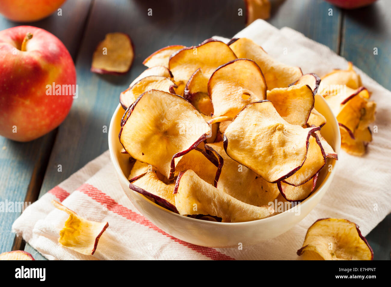 Baked Dehydrated Apples Chips in a Bowl Stock Photo